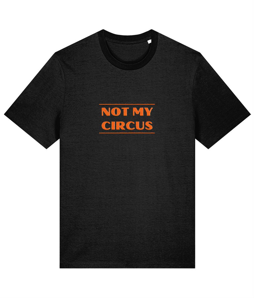 A black organic cotton unisex t-shirt with the slogan 'not my circus' written across the chest in bright orange.
