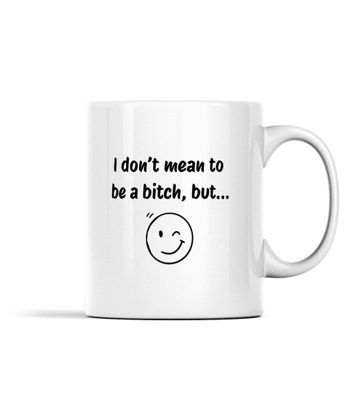 A white ceramic mug with a winky face design on the side and the words 'I don't mean to be a bitch, but...'