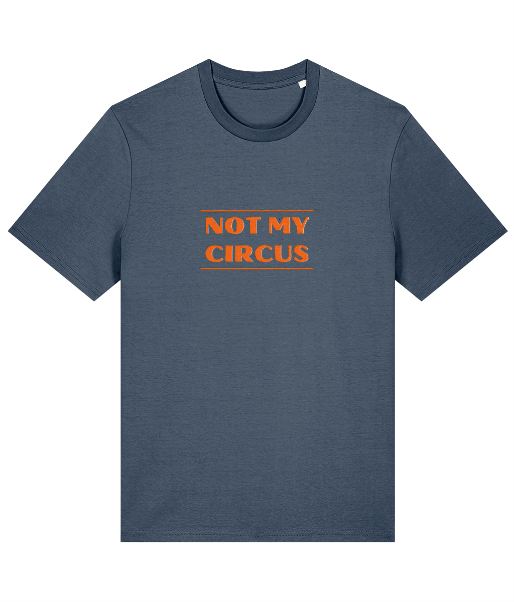 A dark heather blue organic cotton unisex t-shirt with the slogan 'not my circus' written across the chest in bright orange.