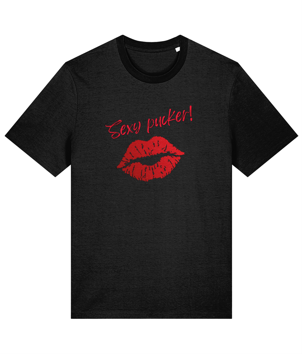 A black organic cotton unisex t-shirt with bright red lips and the words 'Sexy pucker!' on the chest.